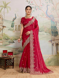 A beautiful red party wear Jimmy Choo Organza saree with intricate embroidery and matching unstitched blouse piece.