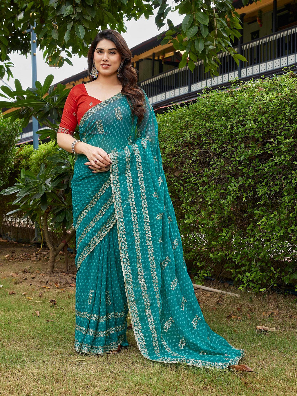 Sky blue embroidered georgette party wear saree with unstitched blouse