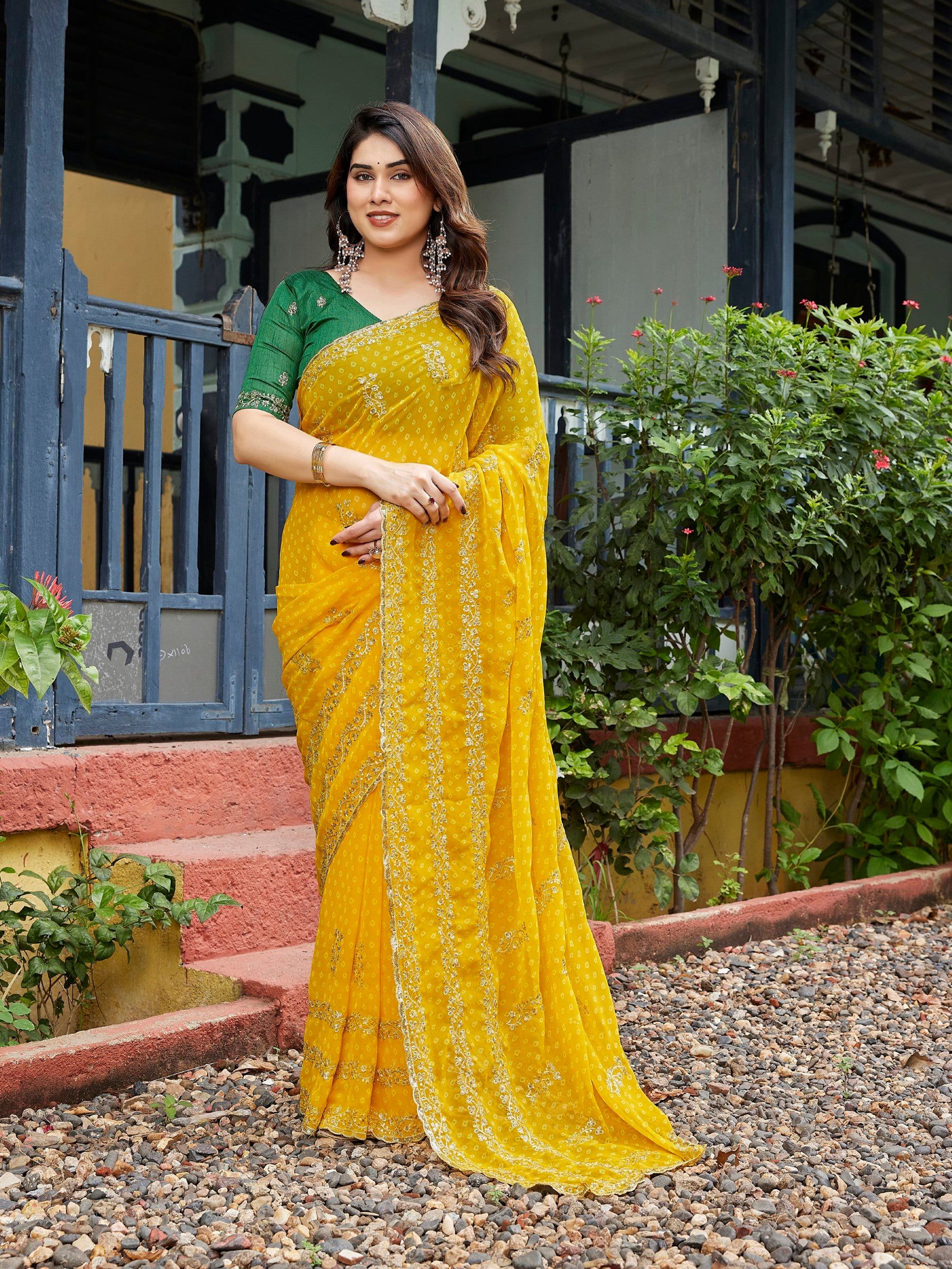 Yellow embroidered georgette party wear saree with unstitched blouse