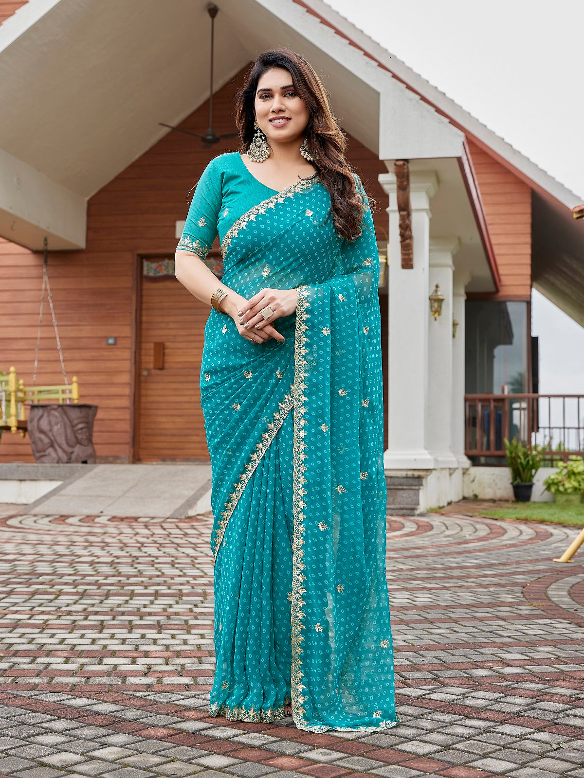 Turquoise blue party wear georgette saree with intricate embroidery work