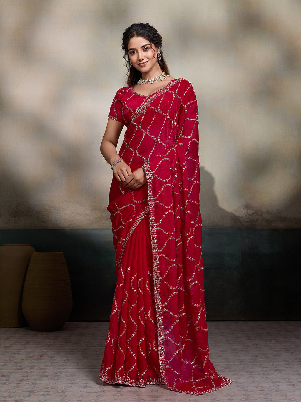 Red embroidered Jimmy Choo Fandy party wear saree with matching unstitched blouse