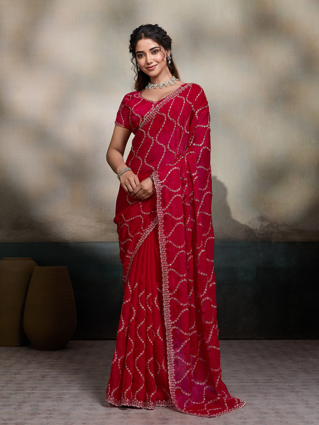 Red embroidered Jimmy Choo Fandy party wear saree with matching unstitched blouse