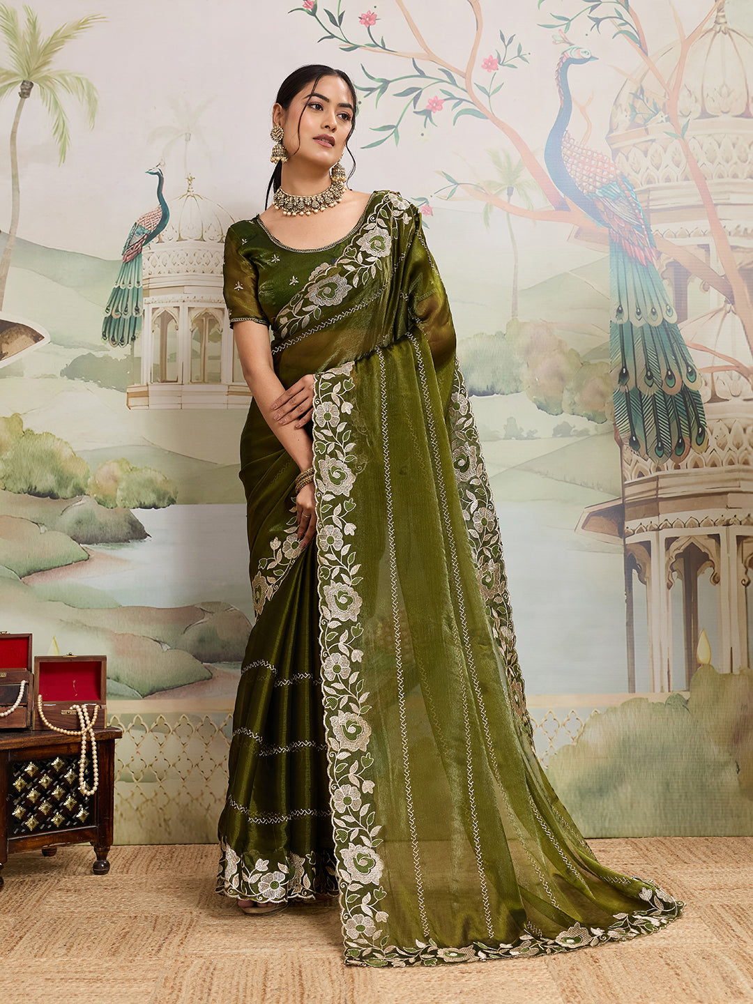 Green embroidered Jimmy Choo Organza saree with unstitched blouse