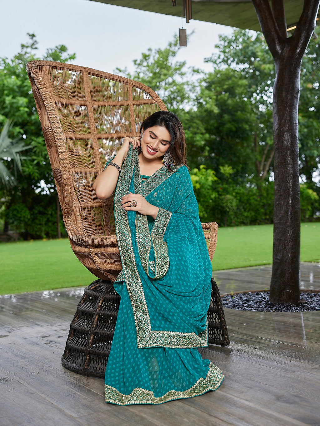 Turquoise Blue Embroidered Georgette Party Wear Saree