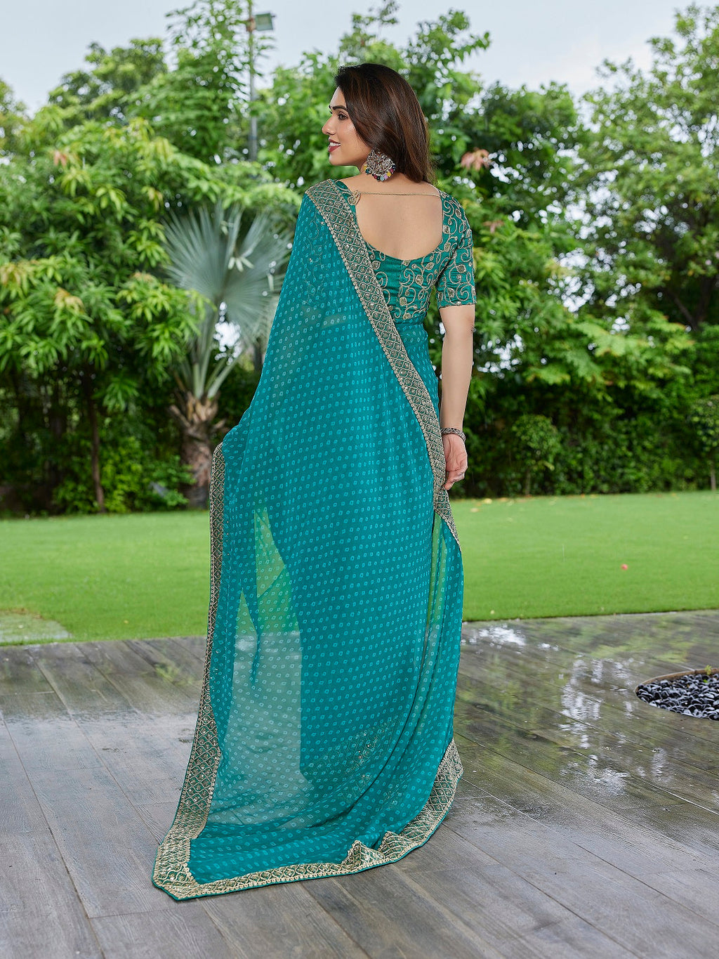 Turquoise Blue Embroidered Georgette Party Wear Saree