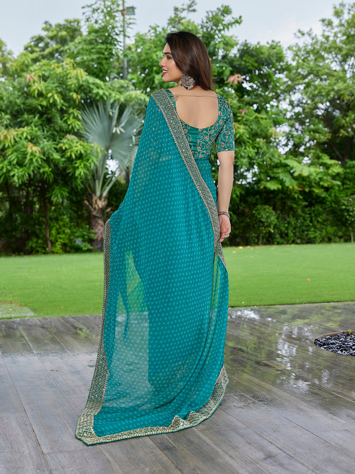 Turquoise Blue Embroidered Georgette Party Wear Saree