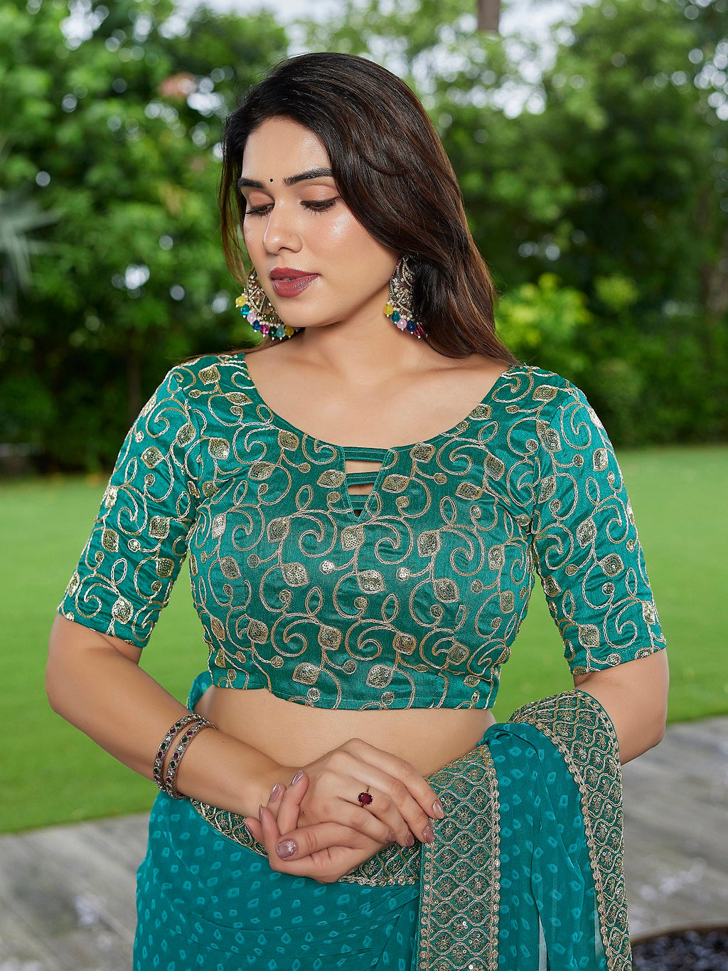 Turquoise Blue Embroidered Georgette Party Wear Saree