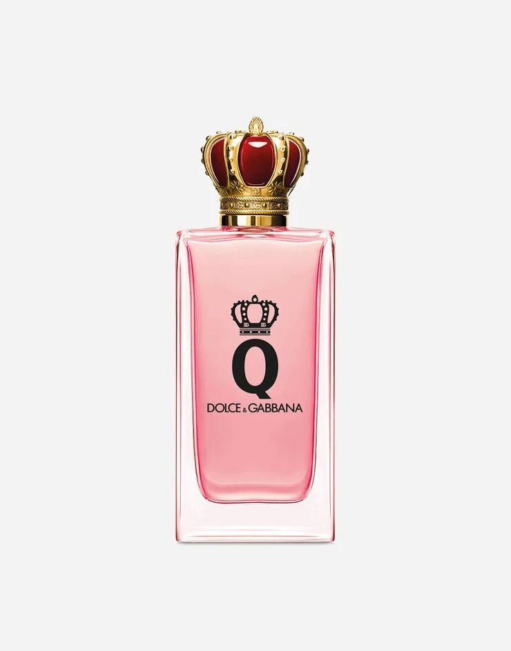 Dolce & Gabbana Q Eau de Parfum bottle in pink and gold, a luxury fruity-woody fragrance for women