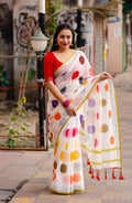 White pure linen saree with polka dot prints and silver woven border