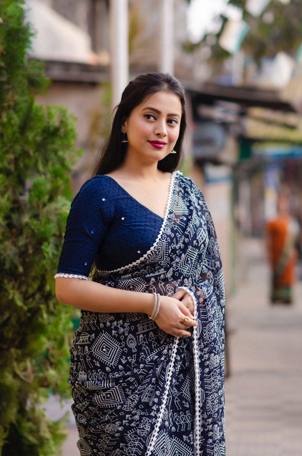 Blue Poly Georgette Saree with Aari Mirror Work and Ethnic Motifs