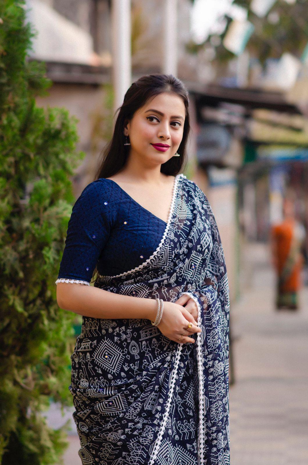 Blue Poly Georgette Saree with Aari Mirror Work and Ethnic Motifs