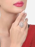 Adjustable silver-tone brass ring worn on a finger showing minimalist design