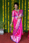 Elegant pink soft handloom silk saree with gold zari weaving and matching unstitched blouse