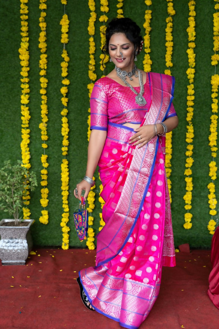 Elegant pink soft handloom silk saree with gold zari weaving and matching unstitched blouse