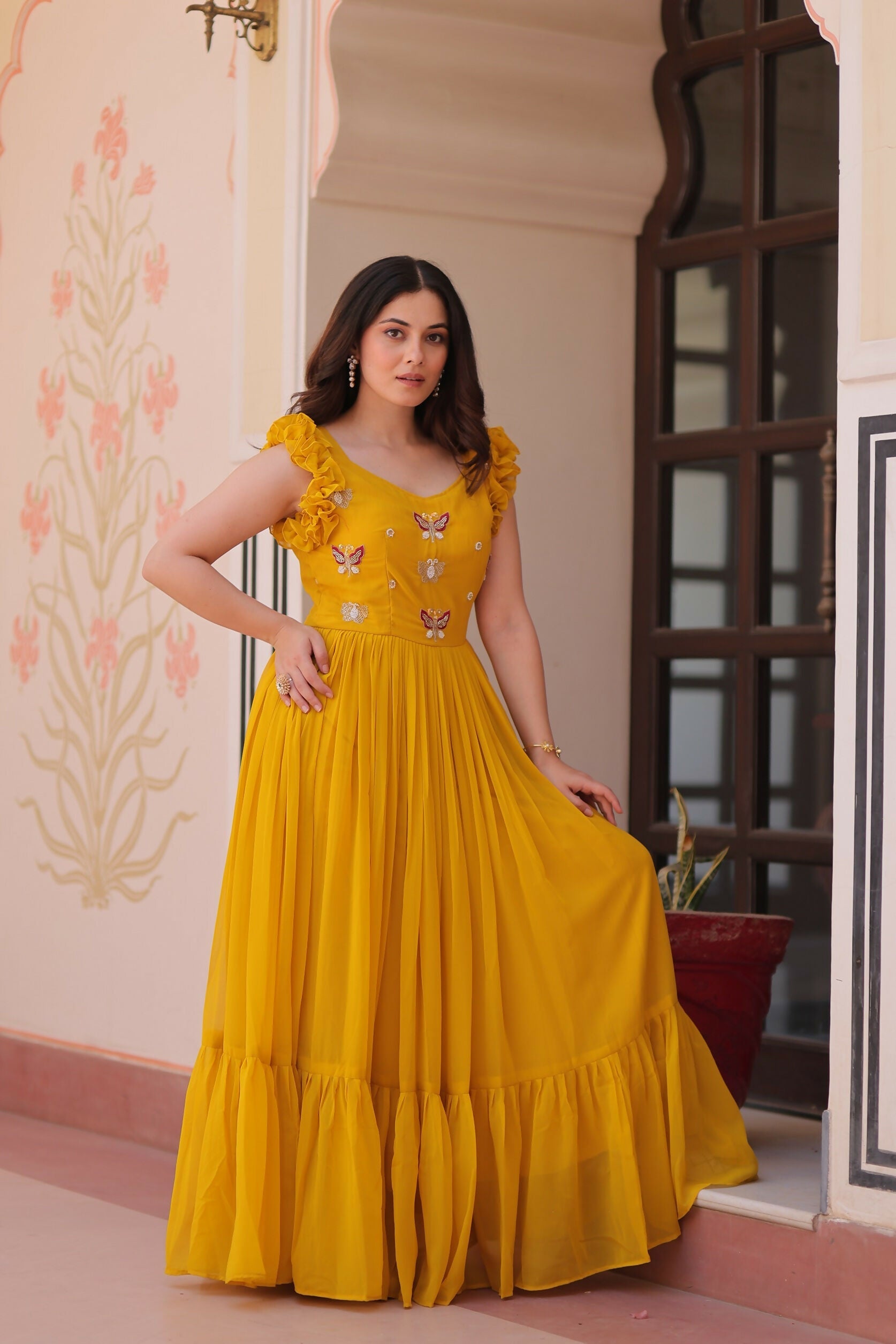 Bright yellow georgette gown with sequence embroidery detailing