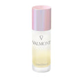 Valmont LumiSence serum in a sleek, minimalist clear and white glass bottle.