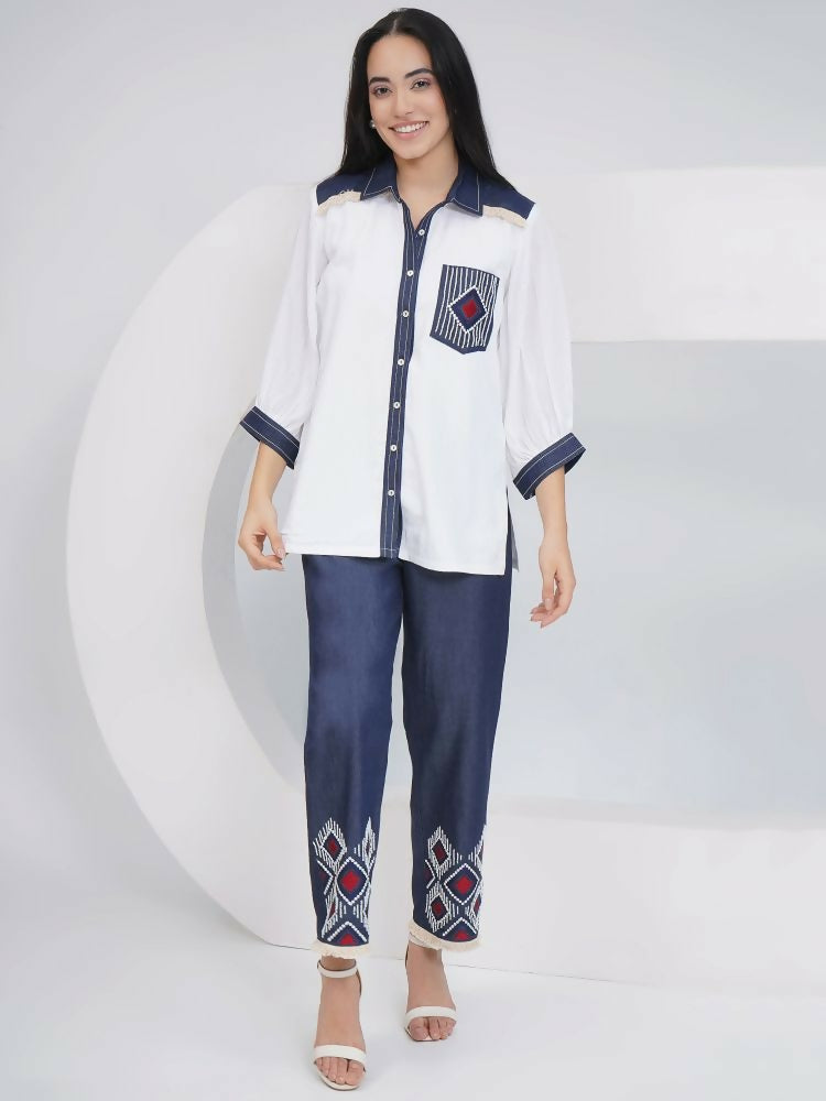 Elegant white rayon crepe shirt and matching pants with detailed hand-embellishment