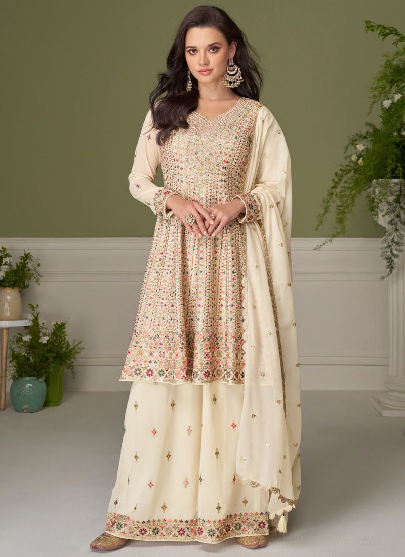 Cream embroidered real georgette salwar suit with elegant traditional detailing