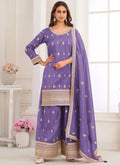 A beautiful purple Simar Silk salwar suit with detailed embroidery for weddings.