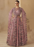 Model wearing a stylish Onion Pink Chinon Silk wedding gown with intricate Gota Patti embroidery