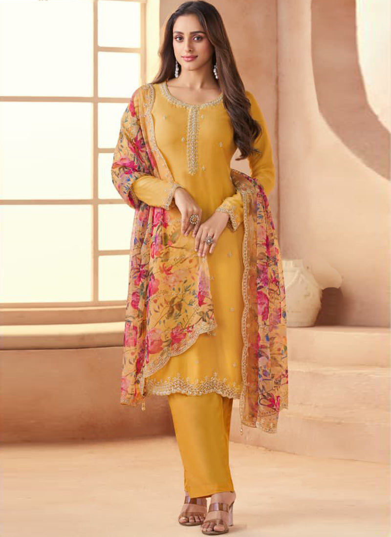 Dark-yellow soft chiffon salwar suit for festive wedding wear.