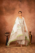Woman wearing a Green and Pink hand block printed cotton suit set