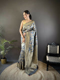 Elegant grey Banarasi saree crafted in soft silk with colorful Meenakari floral and ethnic motifs.