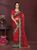 Model wearing a vibrant red digital print georgette party wear saree with matching blouse