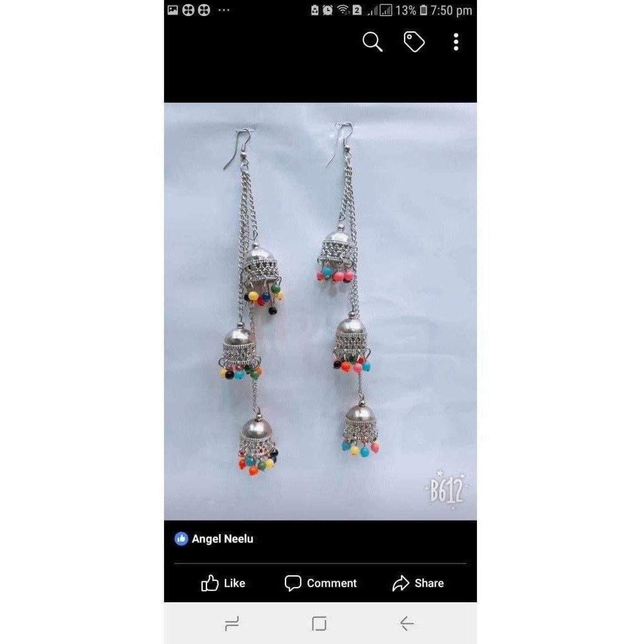 Kashmiri triple-tier jhumki alloy earrings with a tassel hook design for traditional style.