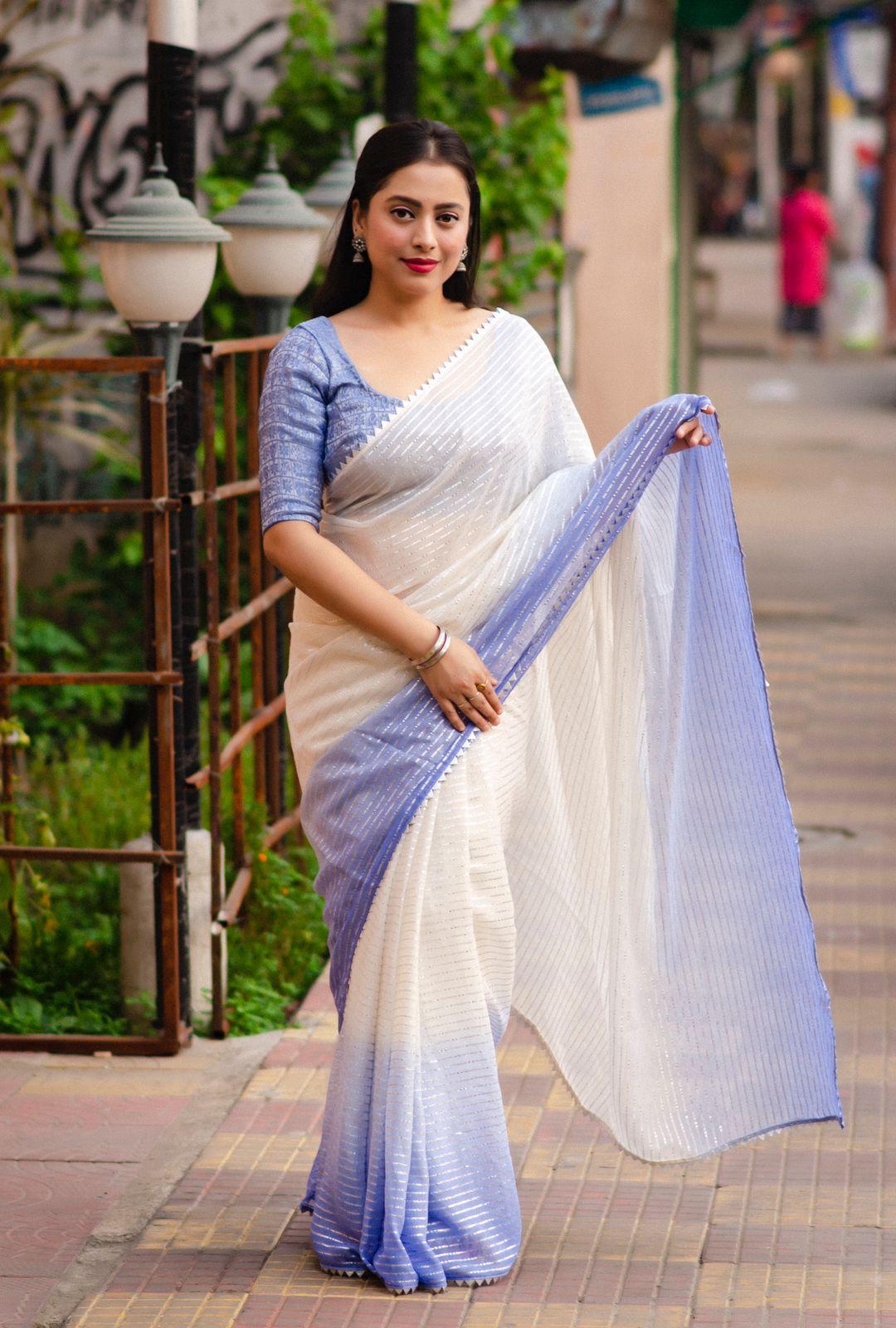 Lavender Poly Chiffon striped saree with silver zari and unstitched patola blouse