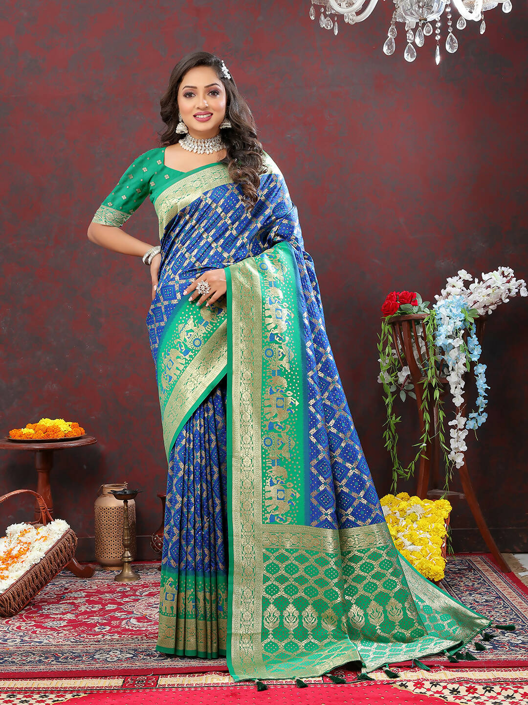 Blue and green Patola silk saree with detailed Meenakari weaving and matching blouse