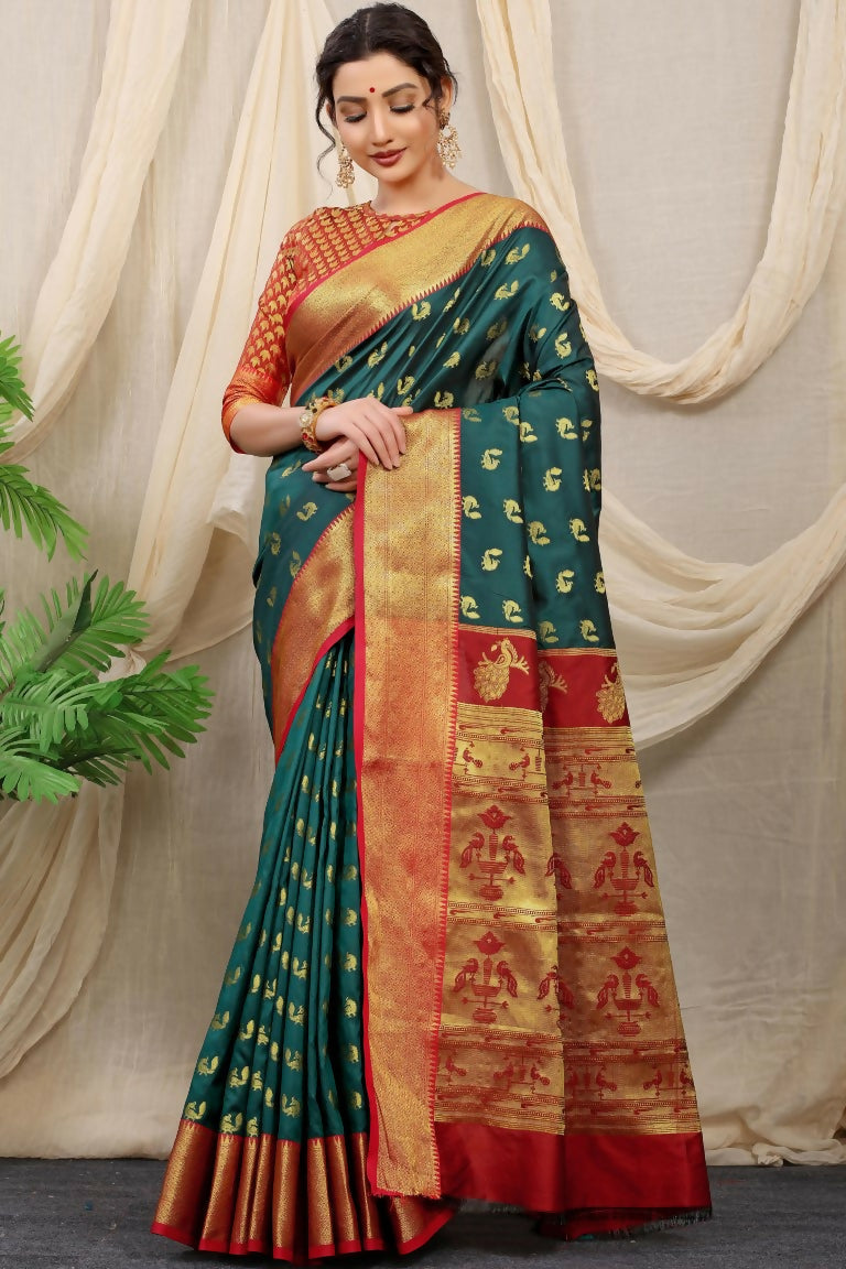 Bottle Green Banarasi silk saree with gold zari work and a matching red blouse.