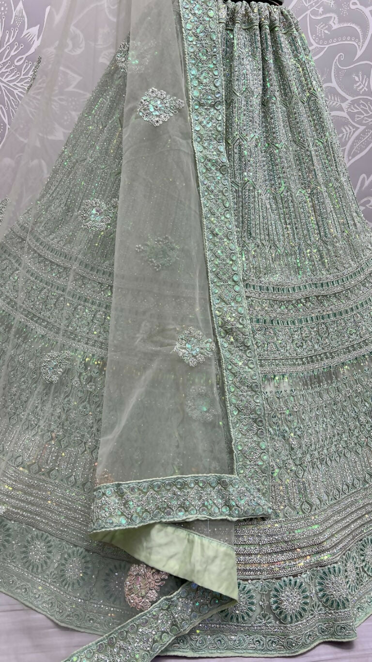 Pista Green Heavy Net Wedding Lehenga Choli with Rainbow Sequins