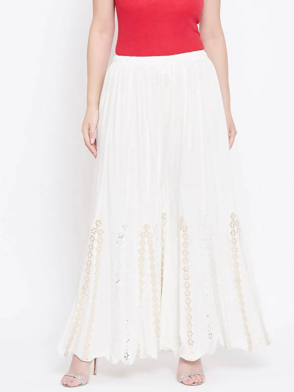 White wide-leg palazzo pants featuring mirror floral embroidery