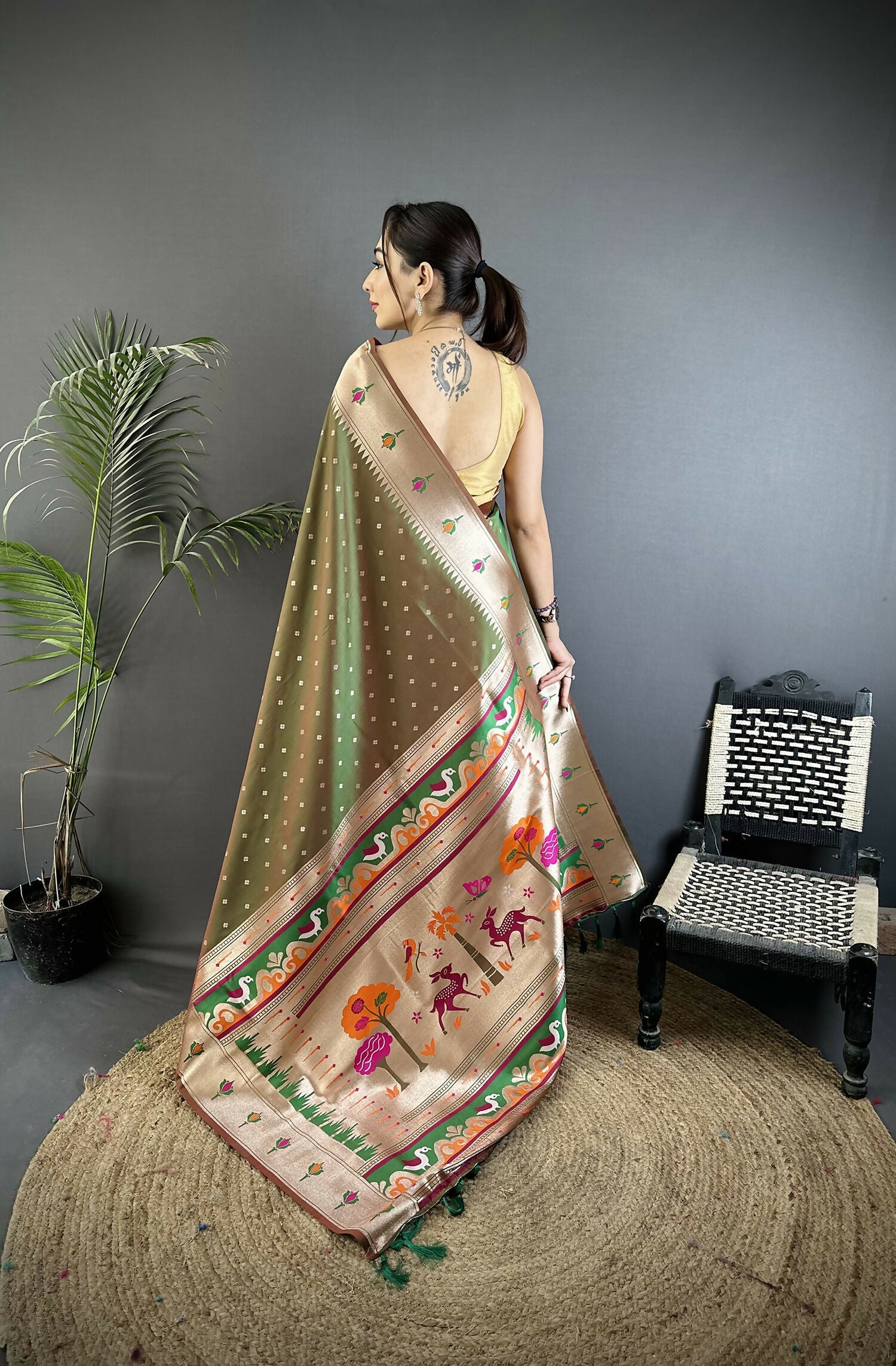 Mehendi Green Peacock and Floral Motif Lichi Silk Kanchipuram Saree