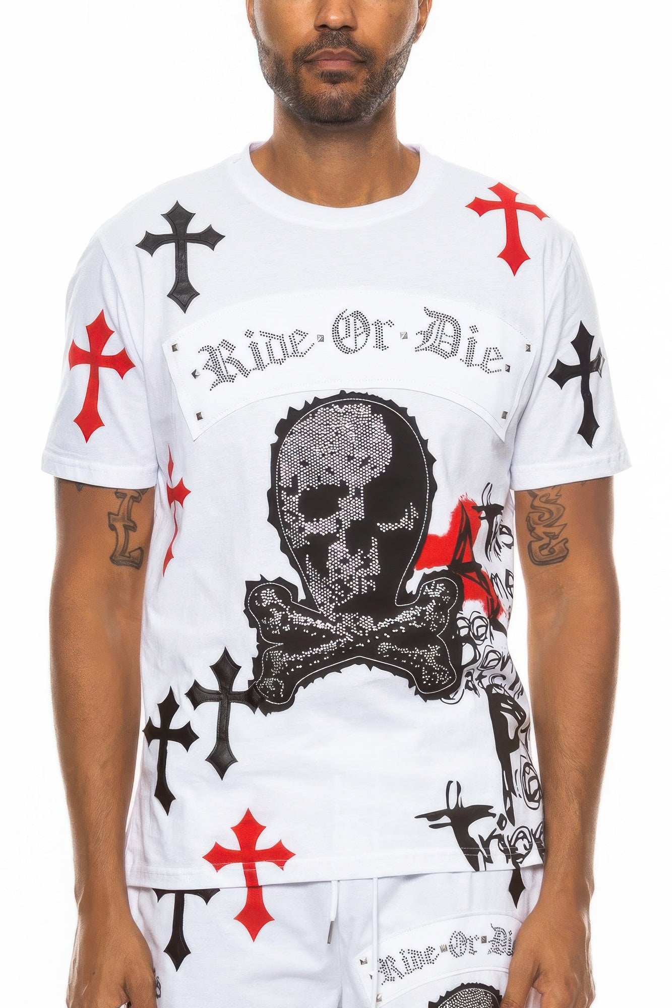 Close-up front view of a man wearing a white t-shirt with a Ride Or Die skull and cross graphic