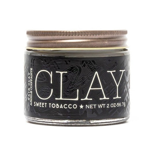 18.21 Man Made Hair Clay in a compact 2oz container