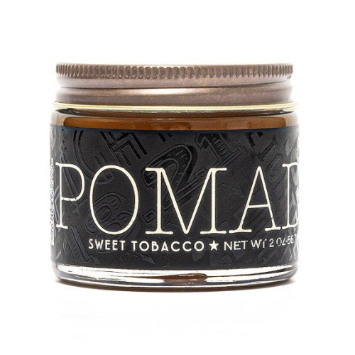 18.21 Man Made Sweet Tobacco Pomade in a vintage-style brown container.