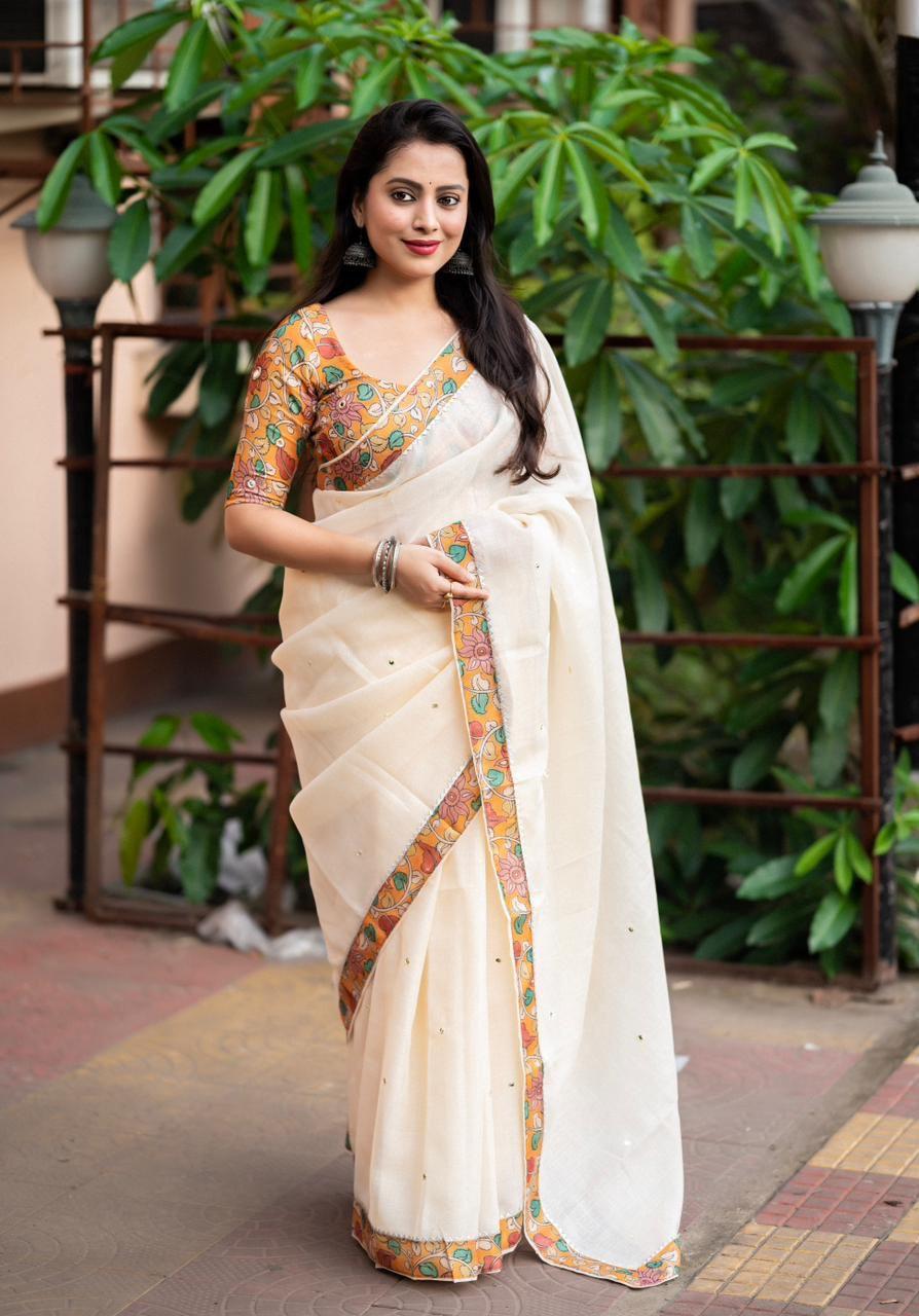 Yellow pure linen saree with aari mirror work and temple border