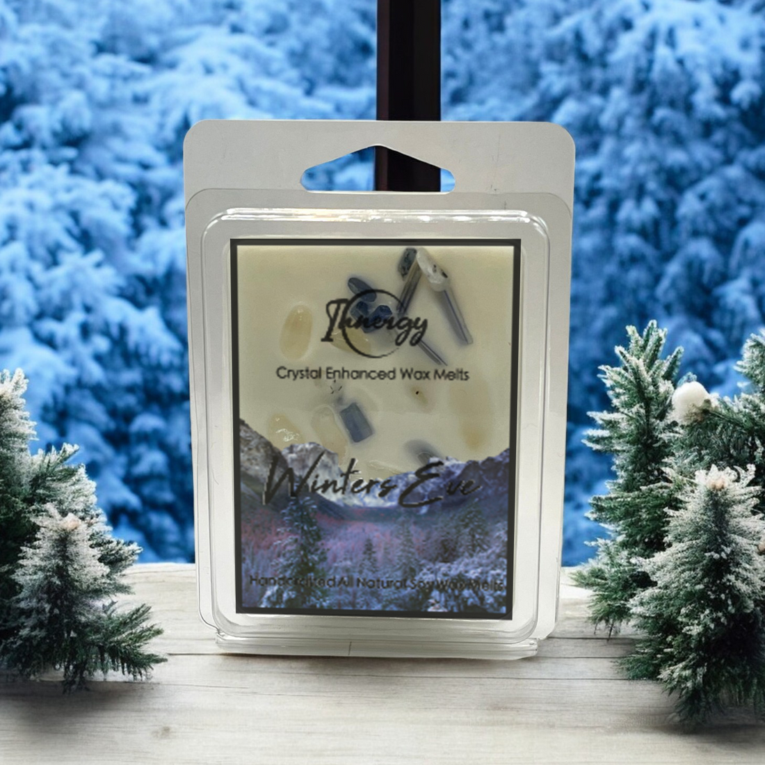 Winter's Eve crystal-enhanced coconut soy wax melts in a plastic container against a snowy pine backdrop.