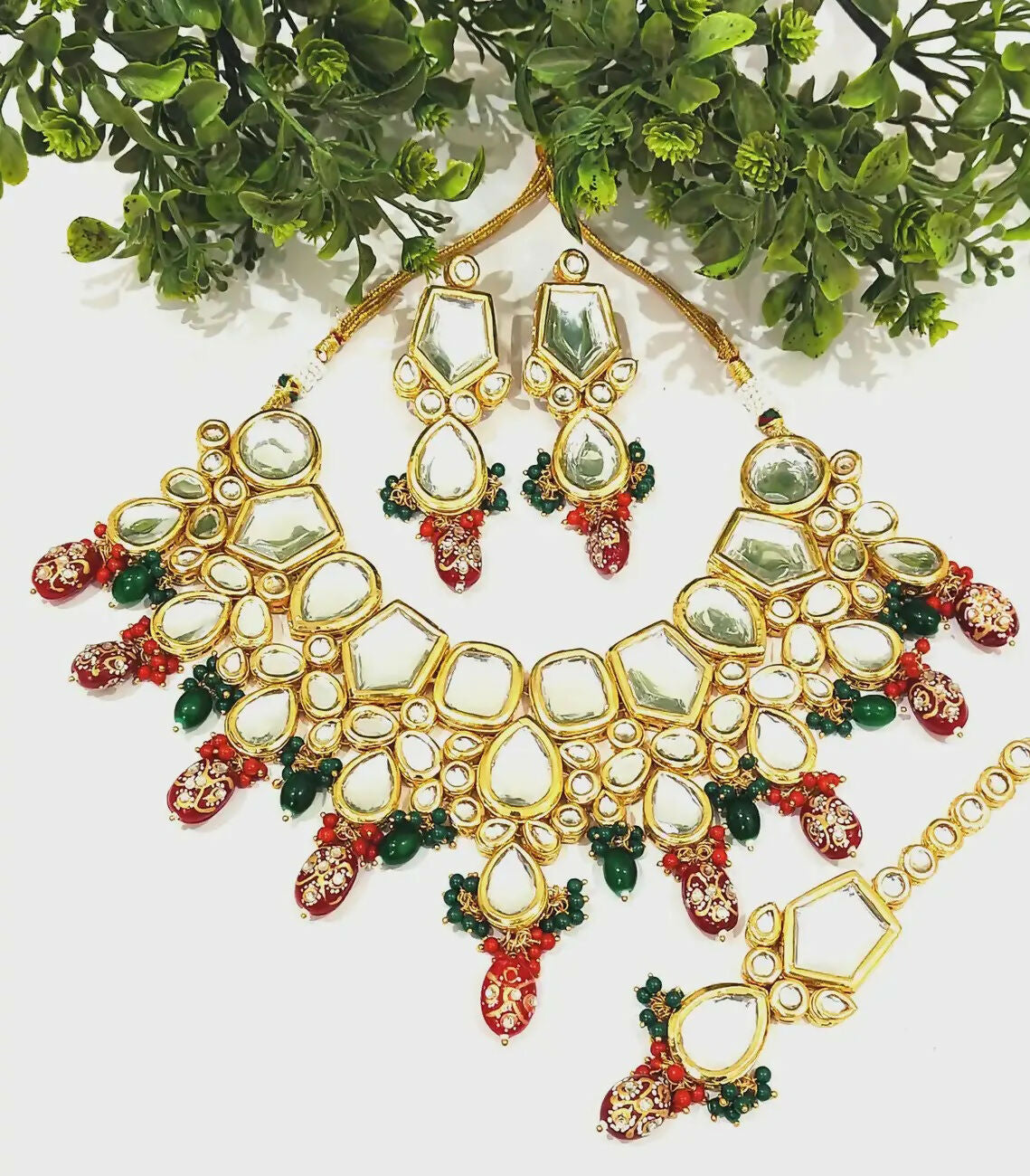 Detailed view of handmade gold-plated Kundan jewellery set