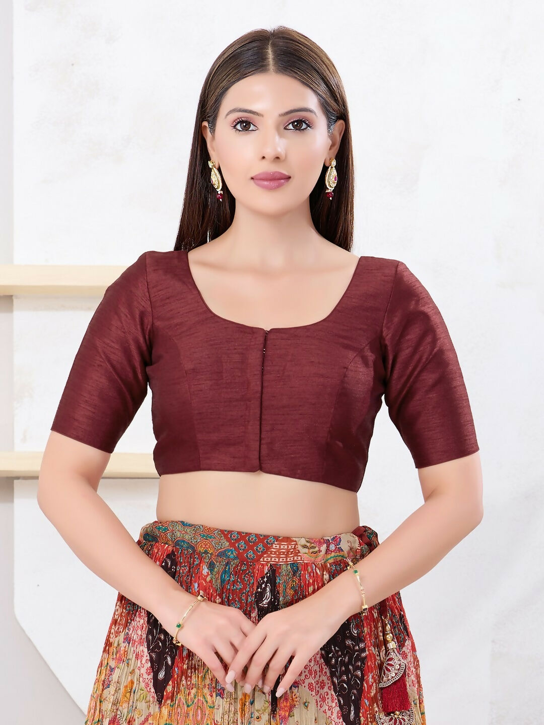 Maroon Dupion Silk sleeveless blouse with round neck front-open closure