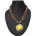 Traditional yellow necklace featuring ornate golden beads, perfect for ethnic outfits