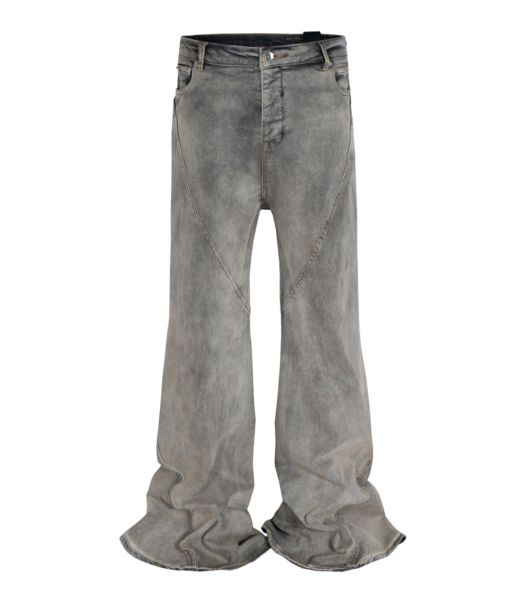 Front view of grey wash wide leg flared denim jeans with structural seam detailing on the thighs.