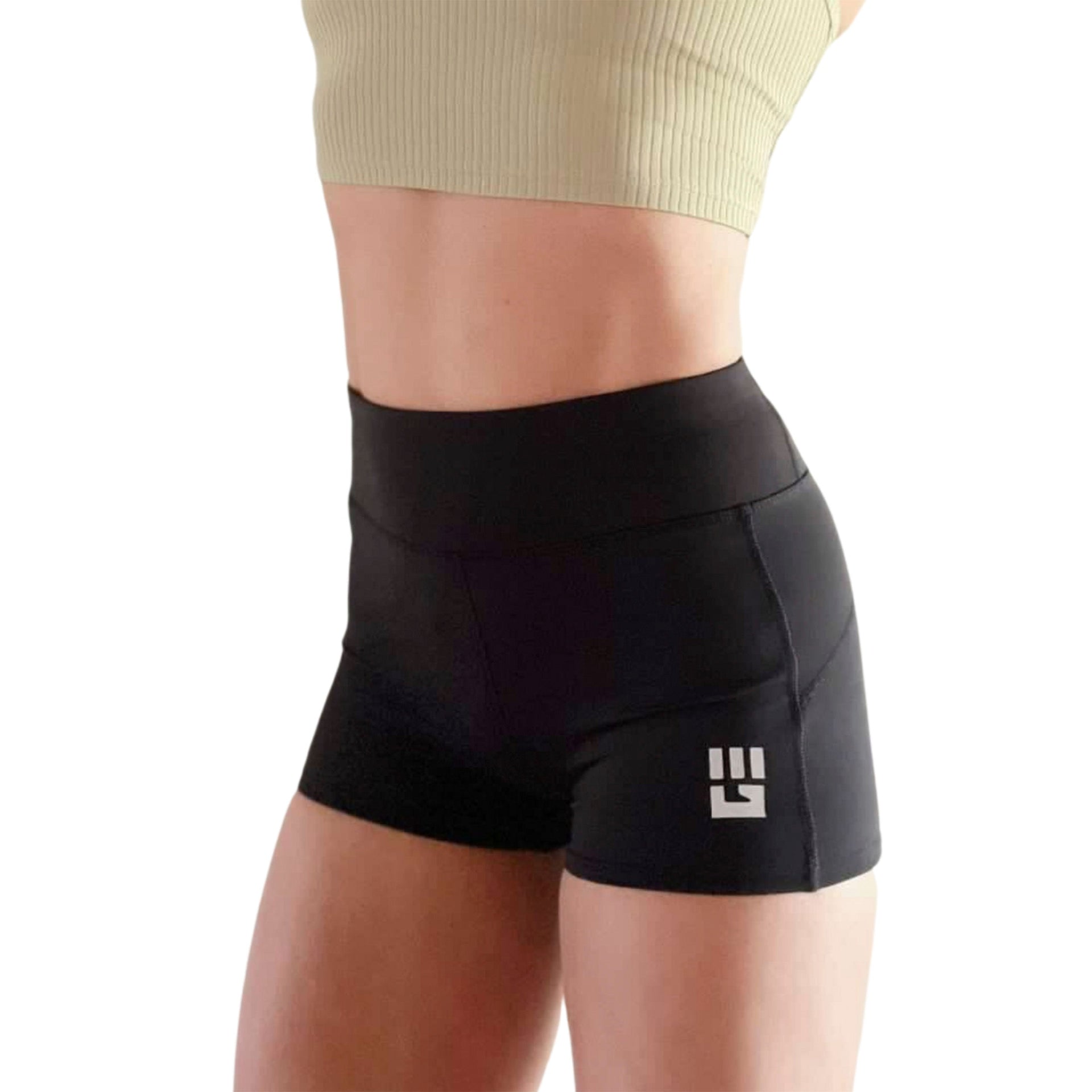 Woman wearing black MudGear Flex-Fit compression shorts with a 2-inch inseam