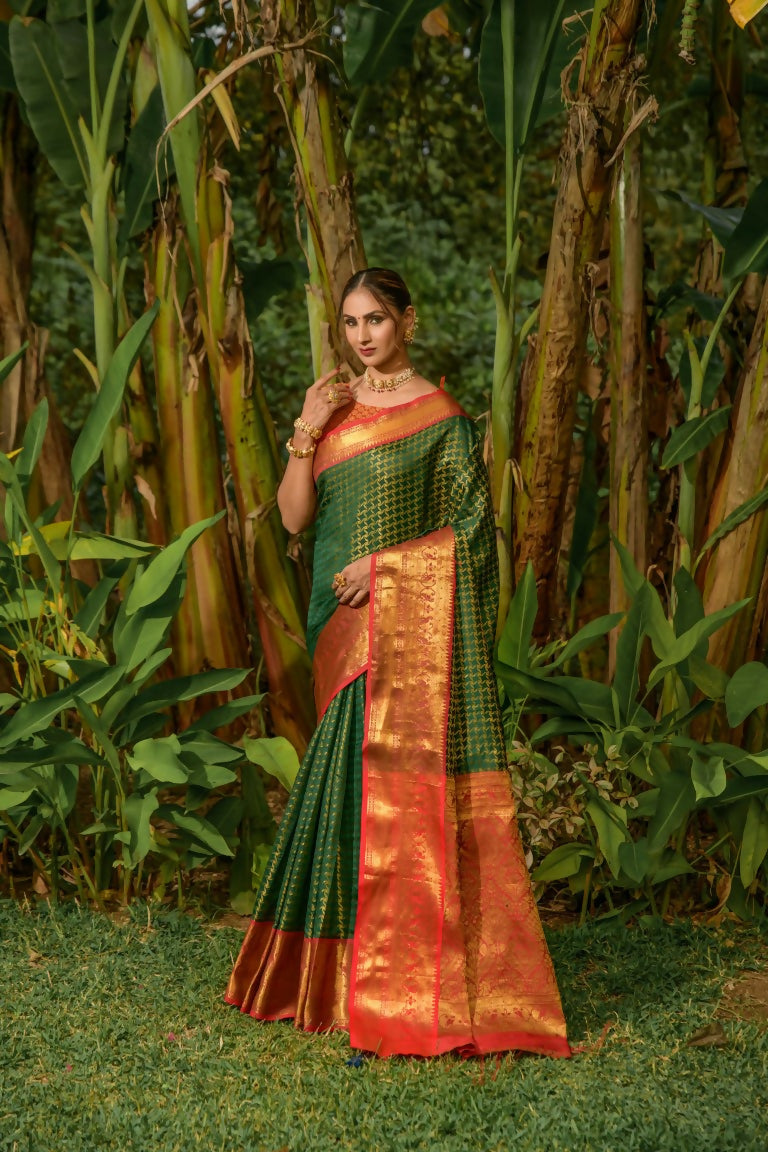 Bottle Green Kanjivaram Silk Saree with Zari work and red blouse