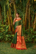 Bottle Green Kanjivaram Silk Saree with Zari work and red blouse