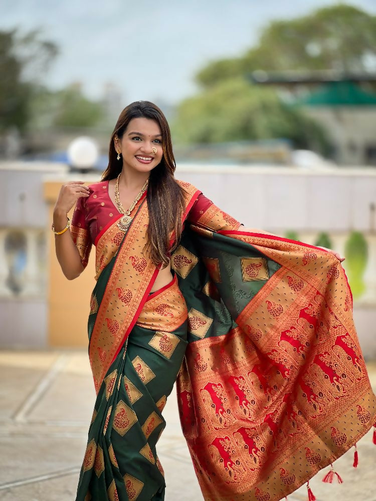 Freen colored Soft Banarasi Silk Saree with detailed Zari weaving and Meenakari design