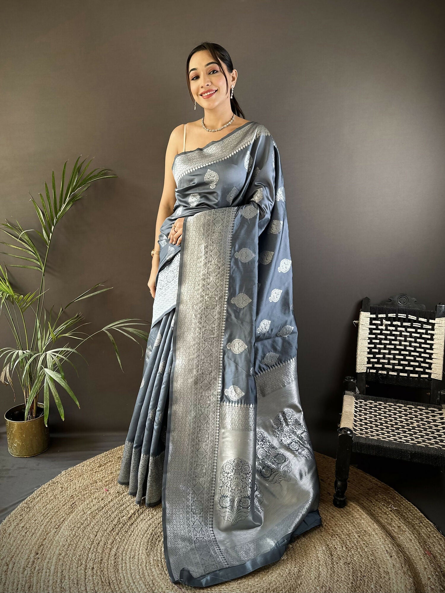 Grey soft silk Banarasi saree with detailed floral motifs