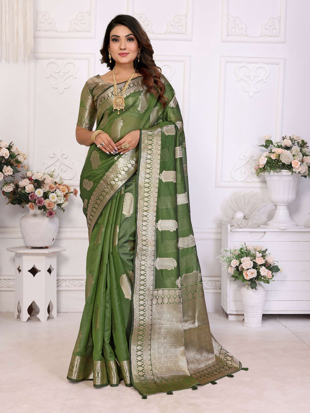 Mehndi colored Soft Organza Silk saree featuring ornate weaving